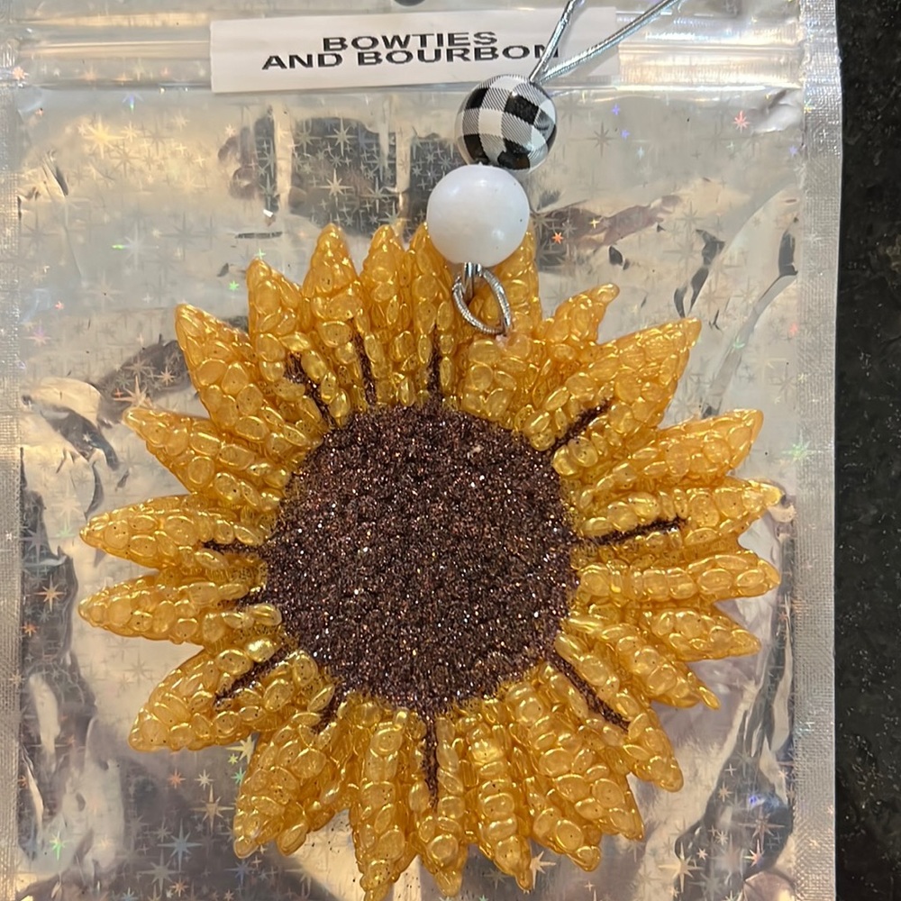 Sunflower car freshie in scent bow ties and burbon